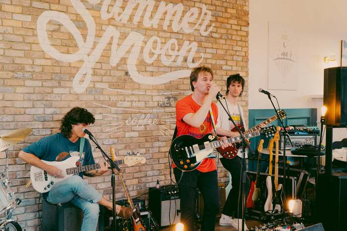 Band performing at a coffee shop